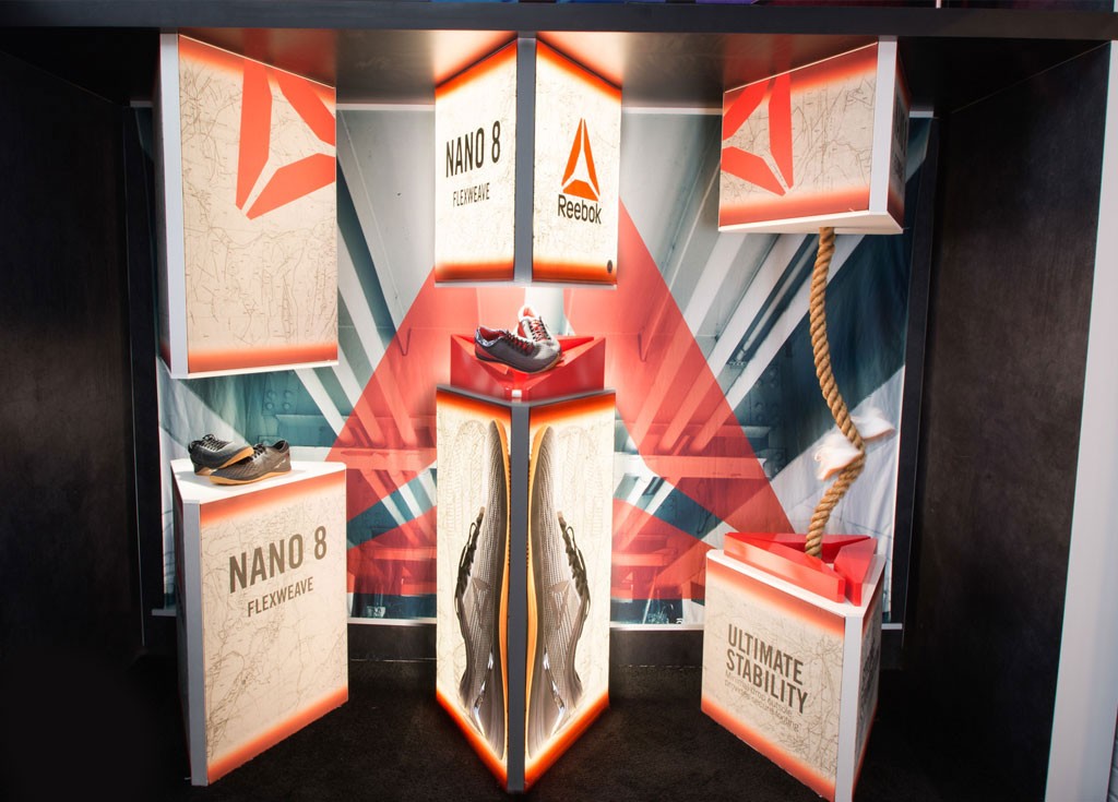 Reebok, trigon display, lightbox accessories, pedestal, retail display, retail, custom shape frame